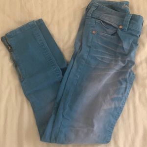 Blue American Rag “super skinny” jeans.